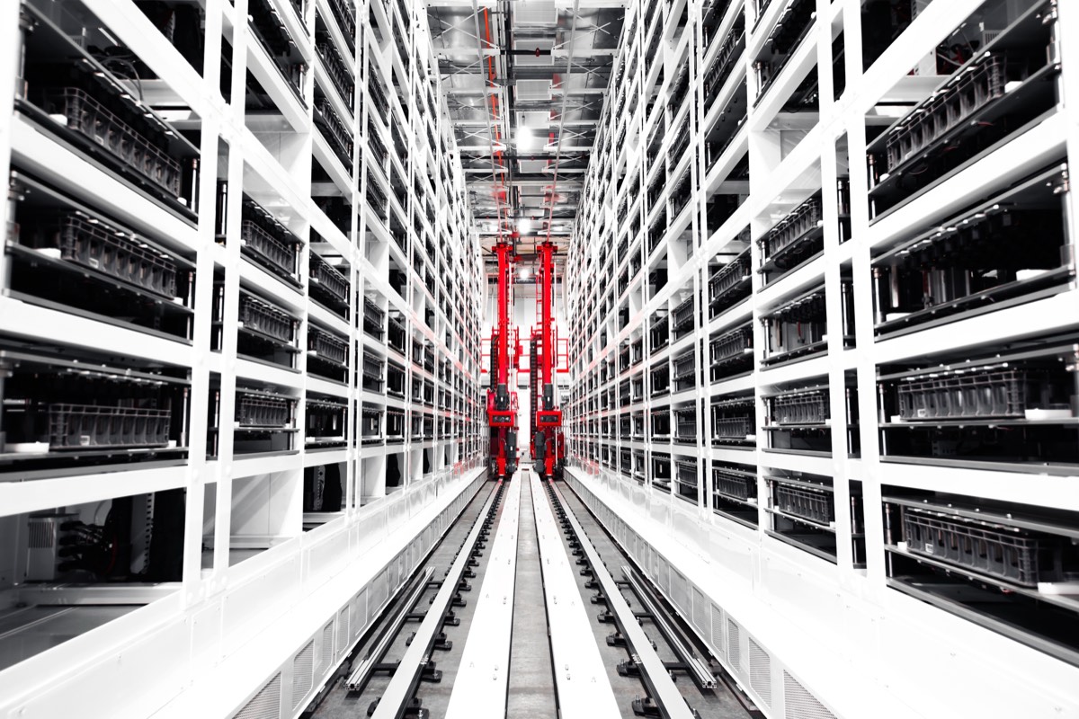 Automated storage and retrieval racks inside a high-tech manufacturing facility