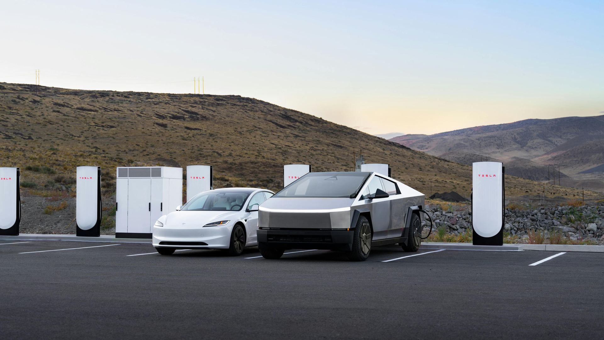 Tesla V4 Supercharger site with vehicles charging